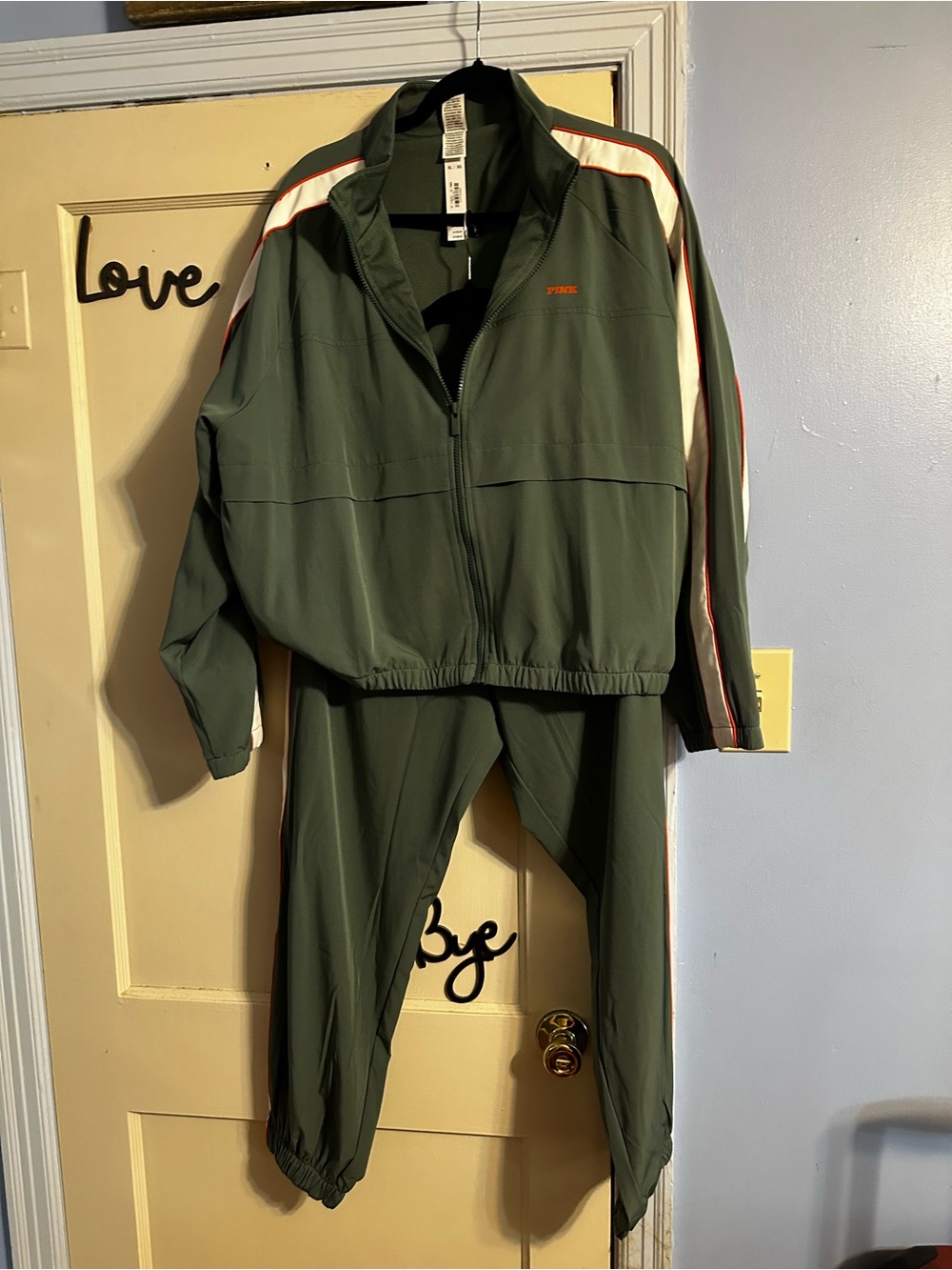 NWT PINK VS Green track suit with white stripes and orange piping